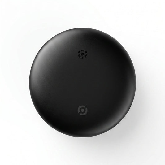 Black round device on a white background